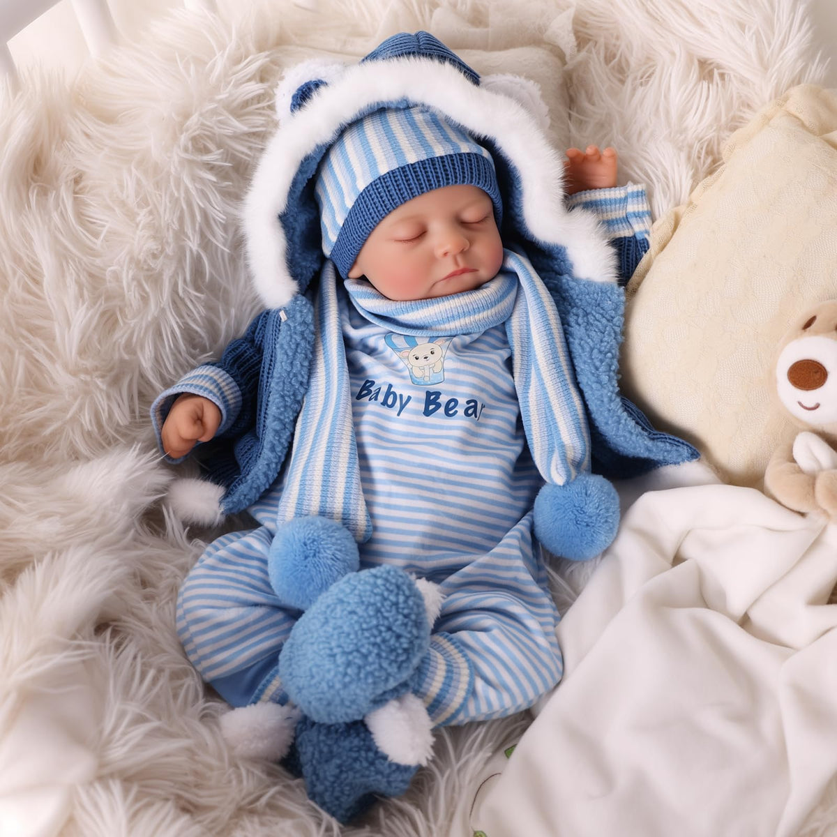 BABESIDE doll hair detail with lashes for lifelike newborn play.
