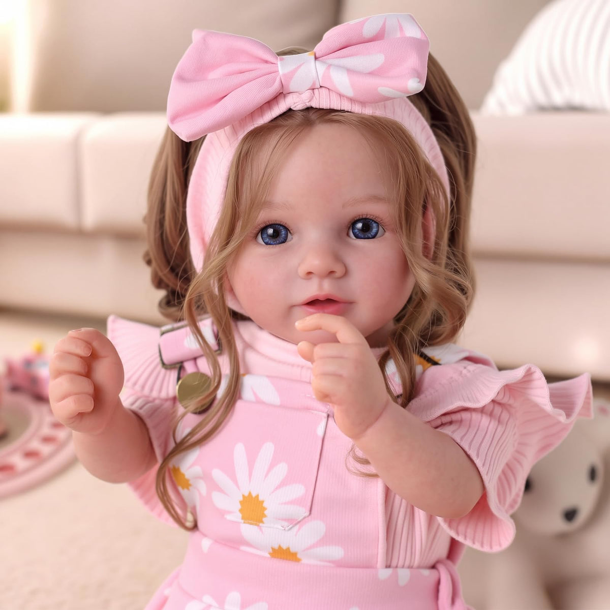 BABESIDE Reborn doll features rooted brown hair for natural styling.