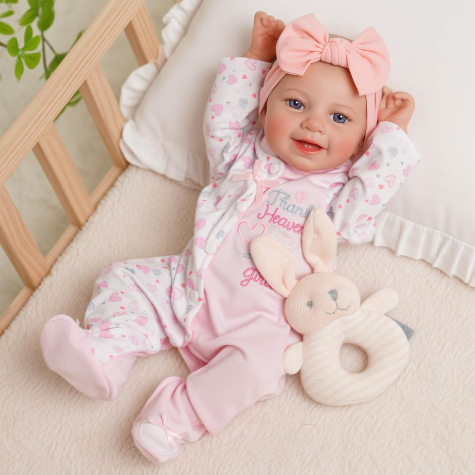 BABESIDE drink-and-wet doll in bear outfit for nurturing role-play.