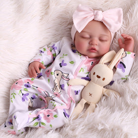BABESIDE lifelike doll sleeping, peaceful cuddle moment for imaginative play.