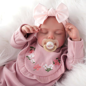BABESIDE lifelike reborn baby doll with poseable limbs for interactive play.