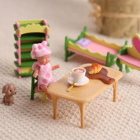 BABESIDE 3-inch silicone baby in pretend play pose for versatile display and storytelling