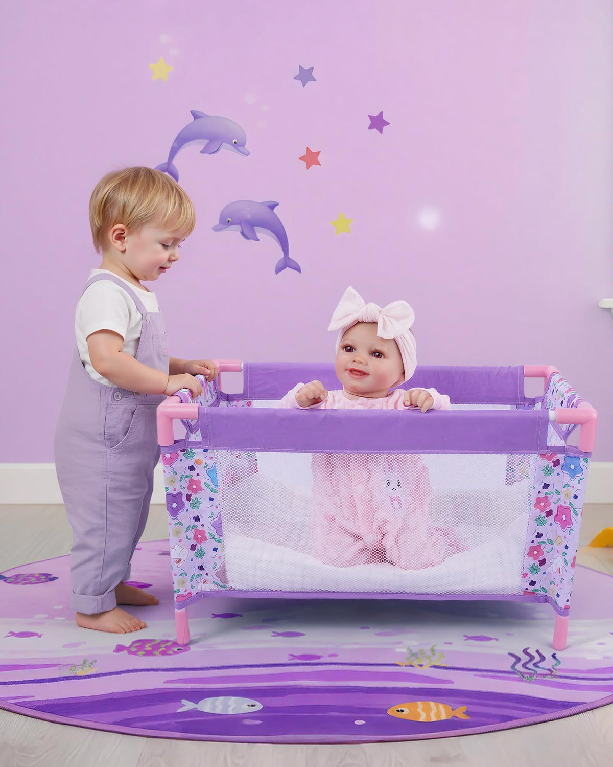 BABESIDE purple doll crib with animal graphic for imaginative play.
