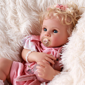 BABESIDE Reborn doll with blue eyes invites gentle pretend-parenting moments.