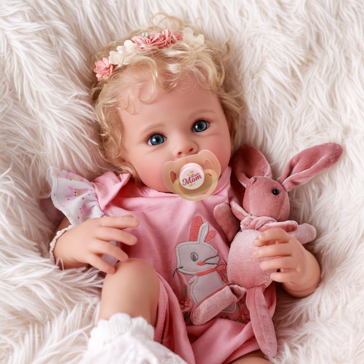BABESIDE Reborn doll with rosy cheeks delivers a warm cuddle experience.