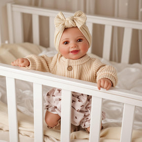 BABESIDE Soft vinyl-huggable body enhances comforting hugs and cuddles.