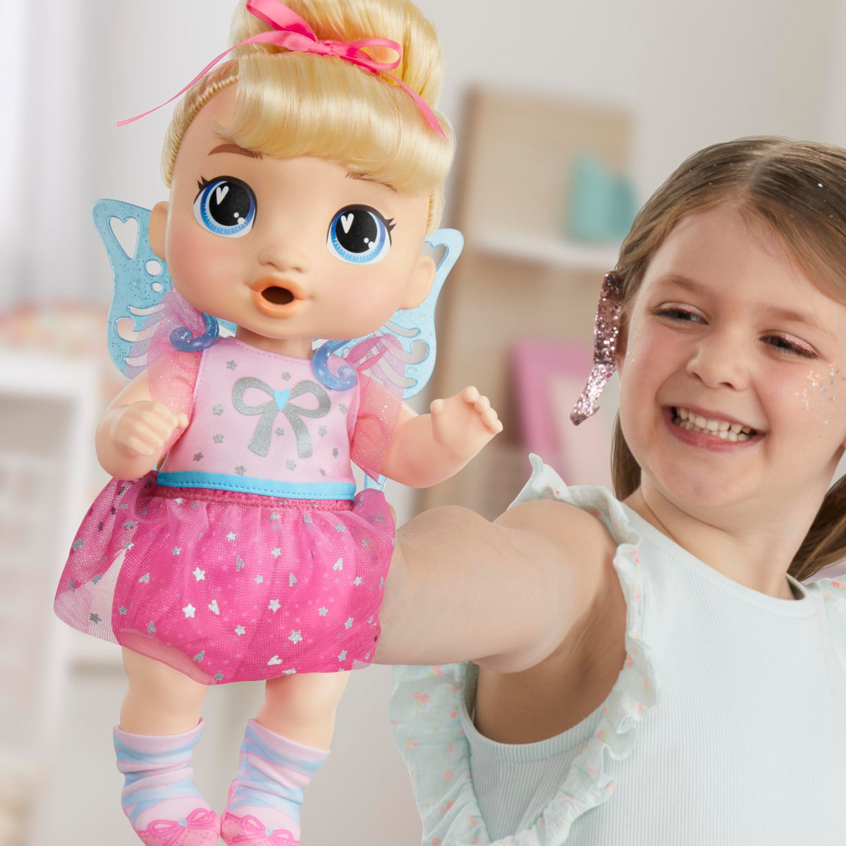 Baby Alive Harper Hugs accessories like wand and wings spark stories