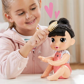 Baby Alive Katie Kat removable onesie for quick outfit changes.