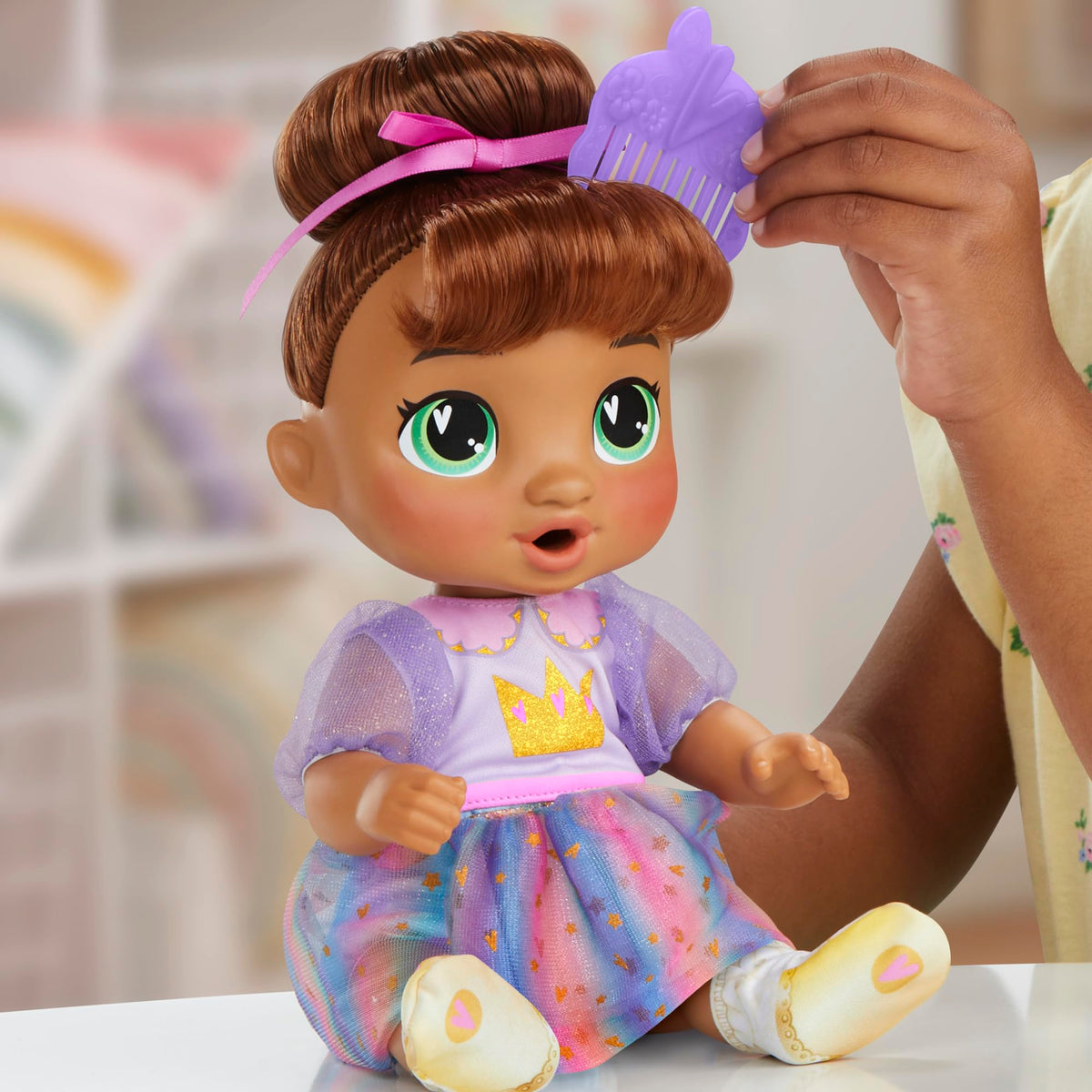 Baby Alive Sophia Sparkle 11-inch doll — compact, poseable for sitting or standing.