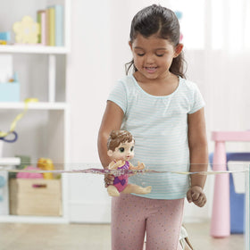 Gift-ready Baby Alive Splash'n Snuggle set with doll and accessories in packaging.