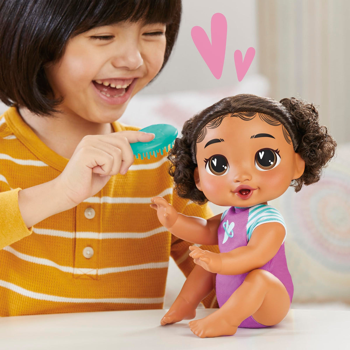 Removeable onesie enables quick dressing and change-for-play outfits.