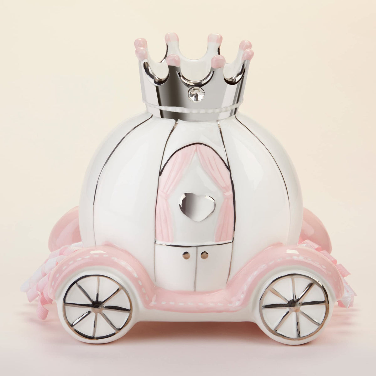 Baby Aspen pink wheels and silver accents decorate a functional baby piggy bank.
