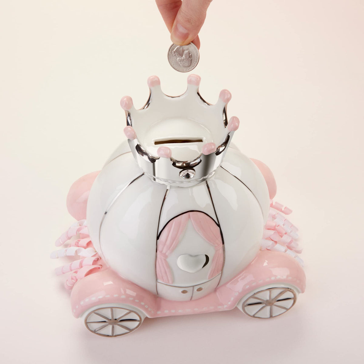 Baby Aspen white ceramic carriage ornament for nursery decor and keepsake display.