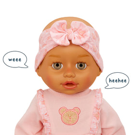 BABY born Olivia giggles and coos, bringing pretend care to life.