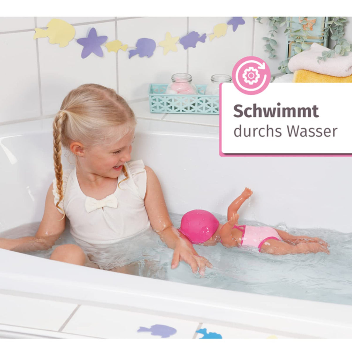 Baby Born swim girl in a pink duck-motif swimsuit for playful bathing.