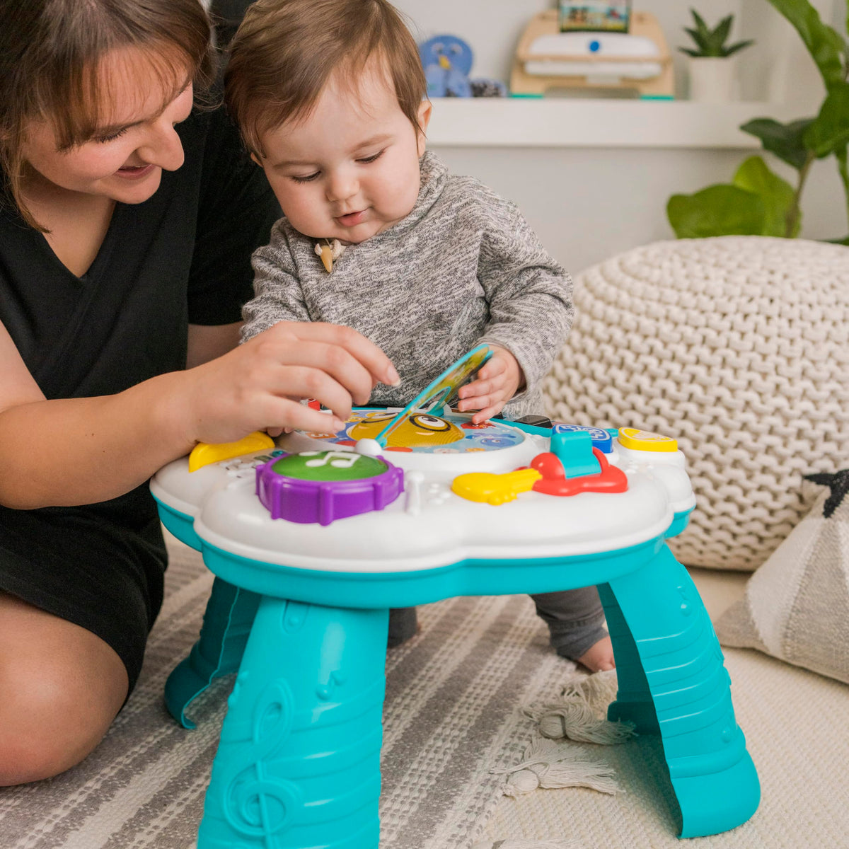 Baby Einstein Discovering Music Table stand legs option supports floor and stand play.