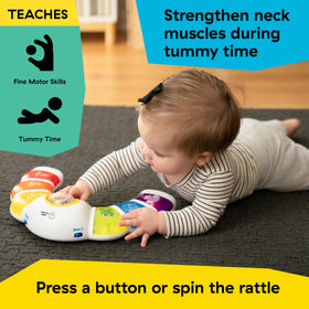 Tummy time with Baby Einstein Glow & Discover encourages lifting the head with lights.