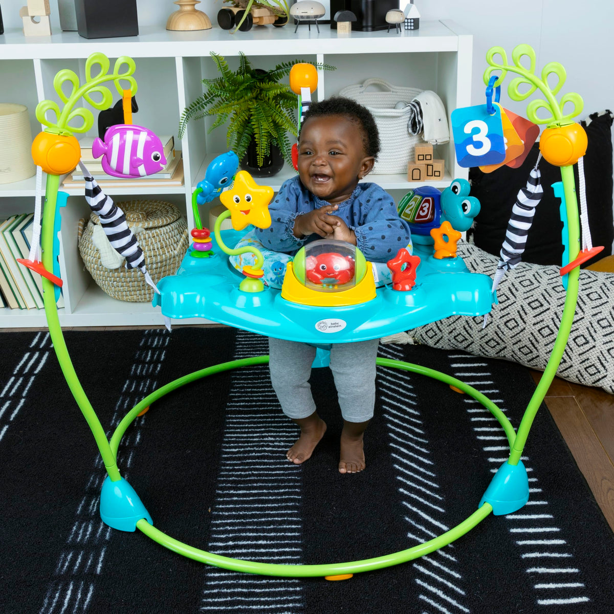 Machine-washable seat pad for easy cleanup after adventures with Baby Einstein.