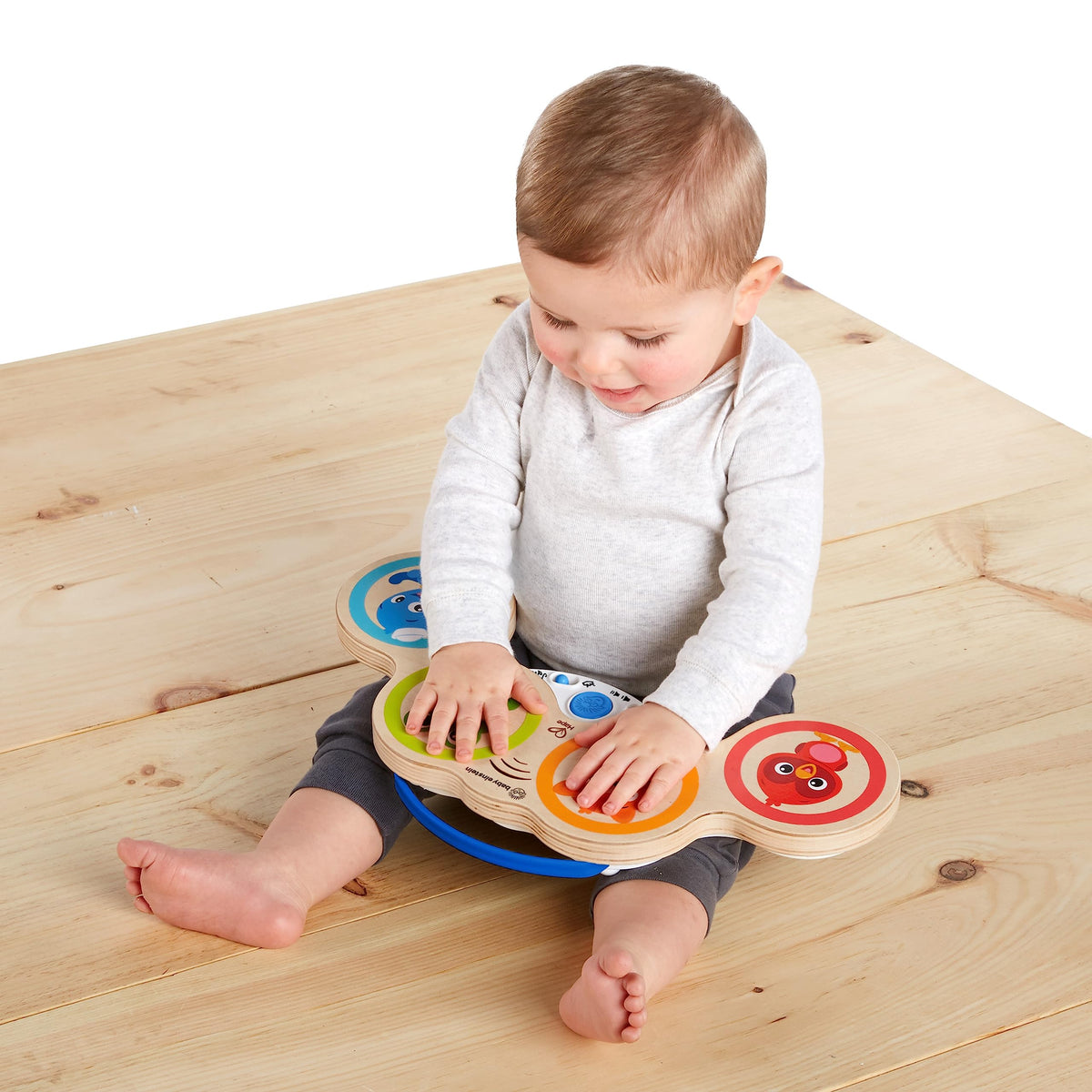 Volume control button details enabling gentle or louder music without waking others.