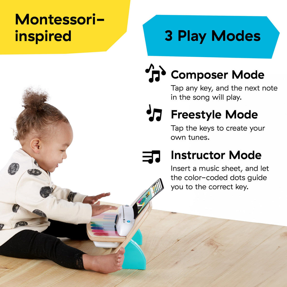 Toddler sits at a bench playing the Baby Einstein Magic Touch Piano