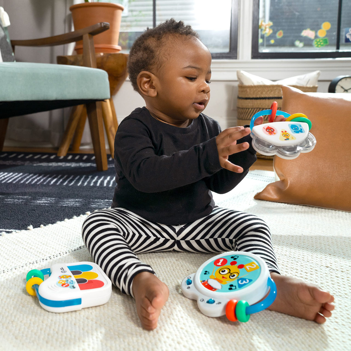 Baby Einstein Small Symphony drum close-up highlights easy-to-grip instrument and soft sounds