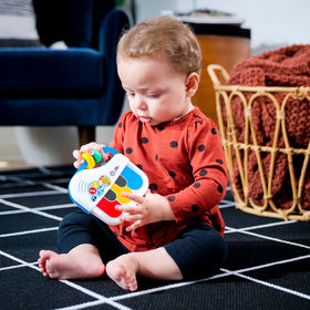 Baby Einstein Small Symphony piano in action with compact design for on-the-go play