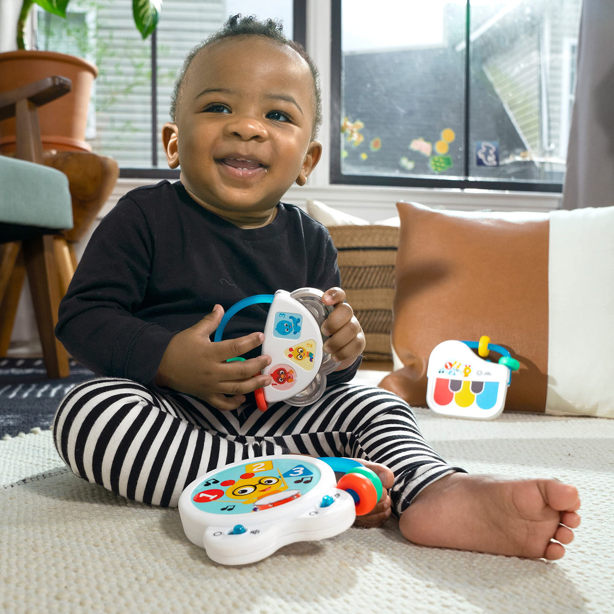 Baby Einstein Small Symphony tambourine jingles softly for calming sound feedback