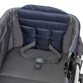 Baby Trend Expedition wagon storage trays and cup holders.