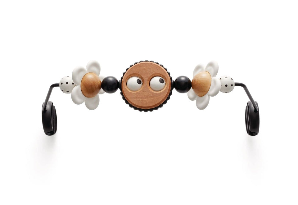 BabyBjörn Googly Eyes toy bar with rotating eyes for visual play.