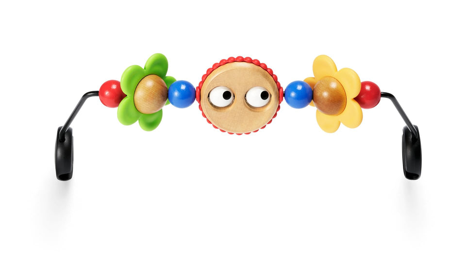 BabyBjörn Googly Eyes toy bar on a Bouncer with rotating shapes for visual tracking.
