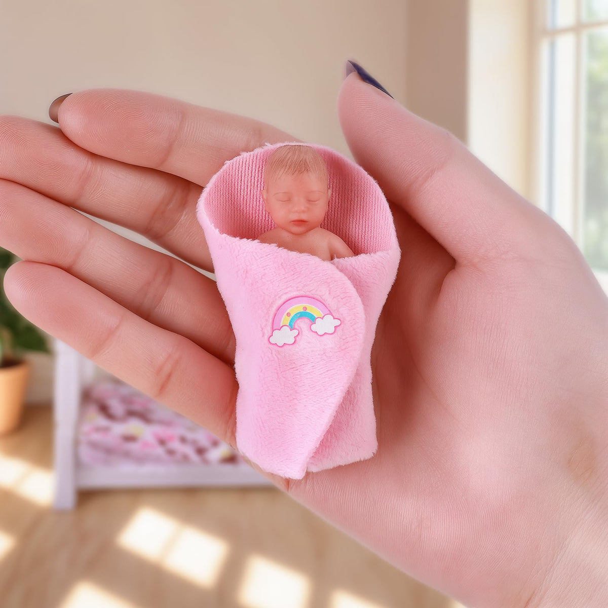 Face close-up of BABESIDE doll highlighting soft silicone feel for realistic newborn vibes