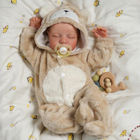 BABESIDE soft-body baby doll, gentle touch for cuddling and nurturing play.
