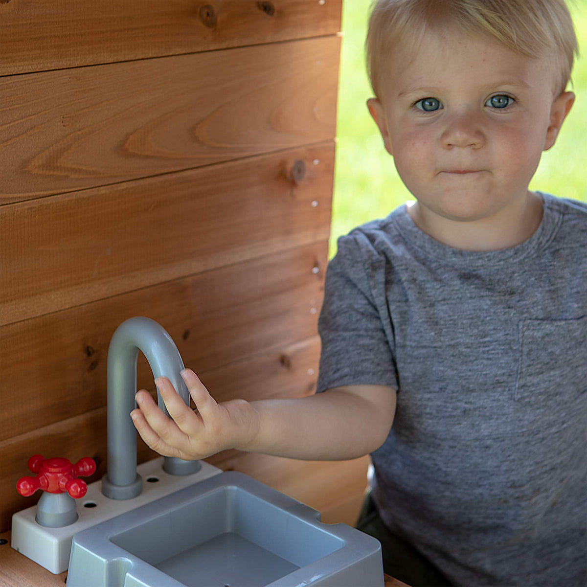Backyard Discovery Aspen ready-to-assemble playhouse for outdoor joy