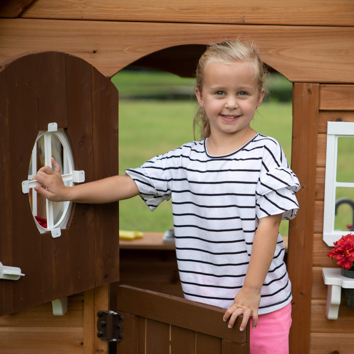 Backyard Discovery Aspen mailbox on picket fence for playhouse realism