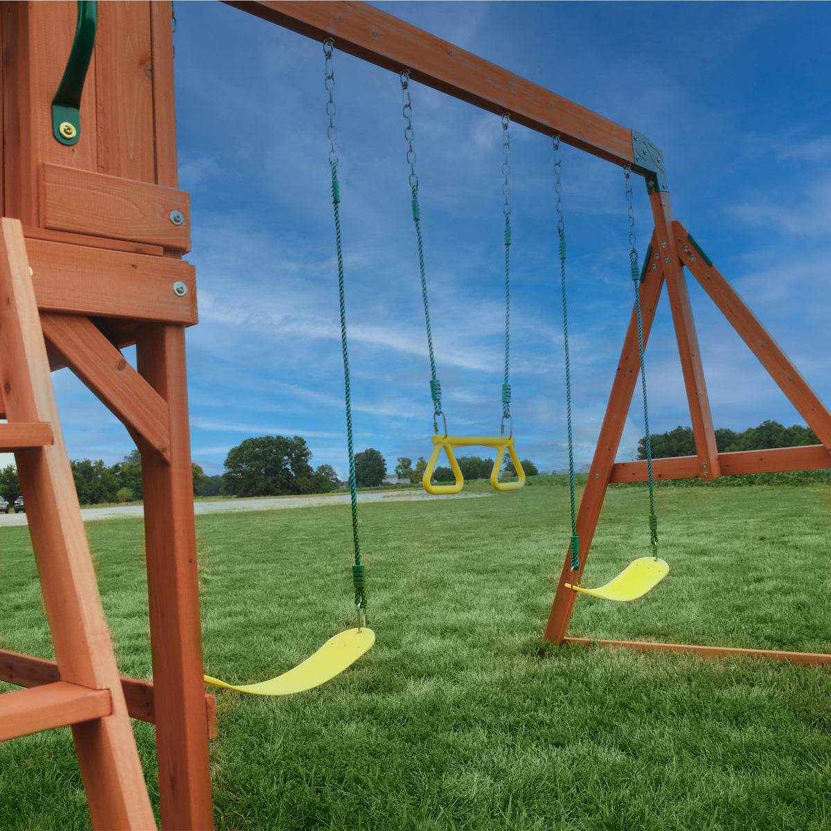 Backyard Discovery Atlantis two belt swings and trapeze enable shared fun.