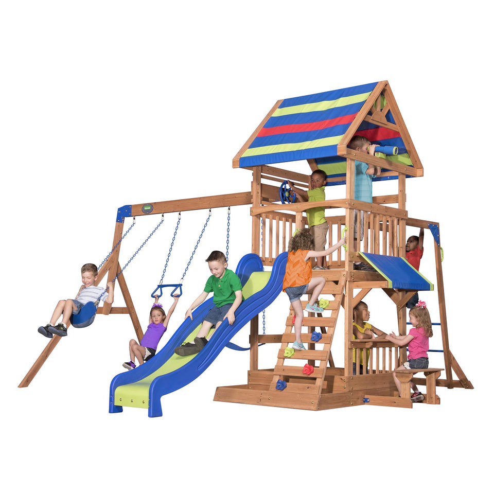 Backyard Discovery Beach Front Cedar Swing Set deck for imaginative play under an open sky.