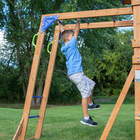 Backyard Discovery Rock Wall Ladder providing safe ascent to the deck.