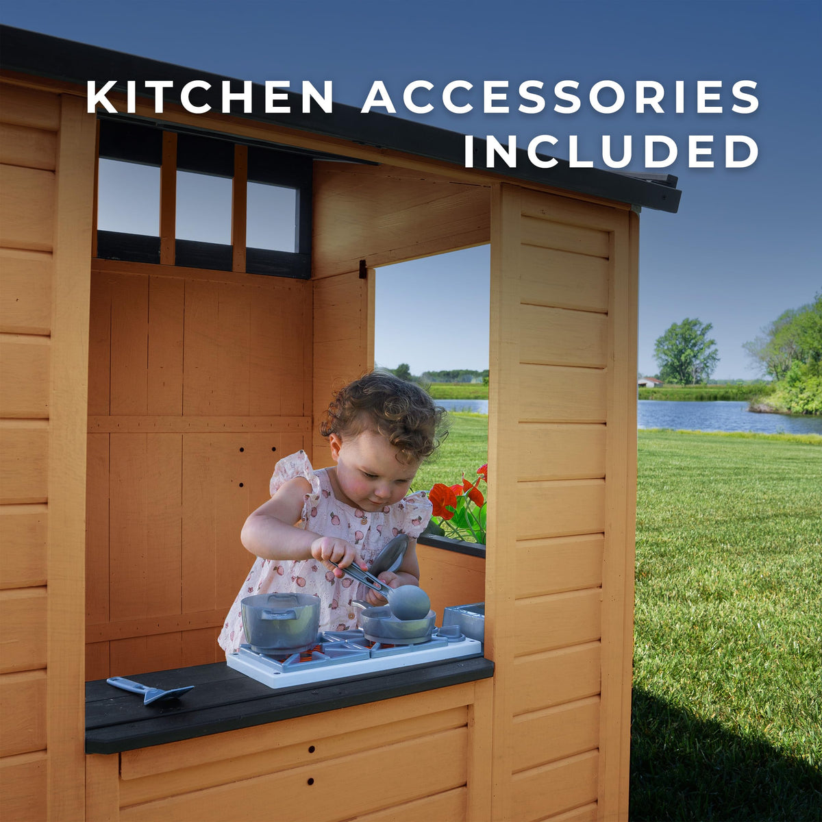 Backyard Discovery Caraway Cottage chalkboard for drawing and storytelling adventures.