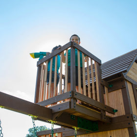 Skyfort II rock climbing wall supports active ascent to the clubhouse.