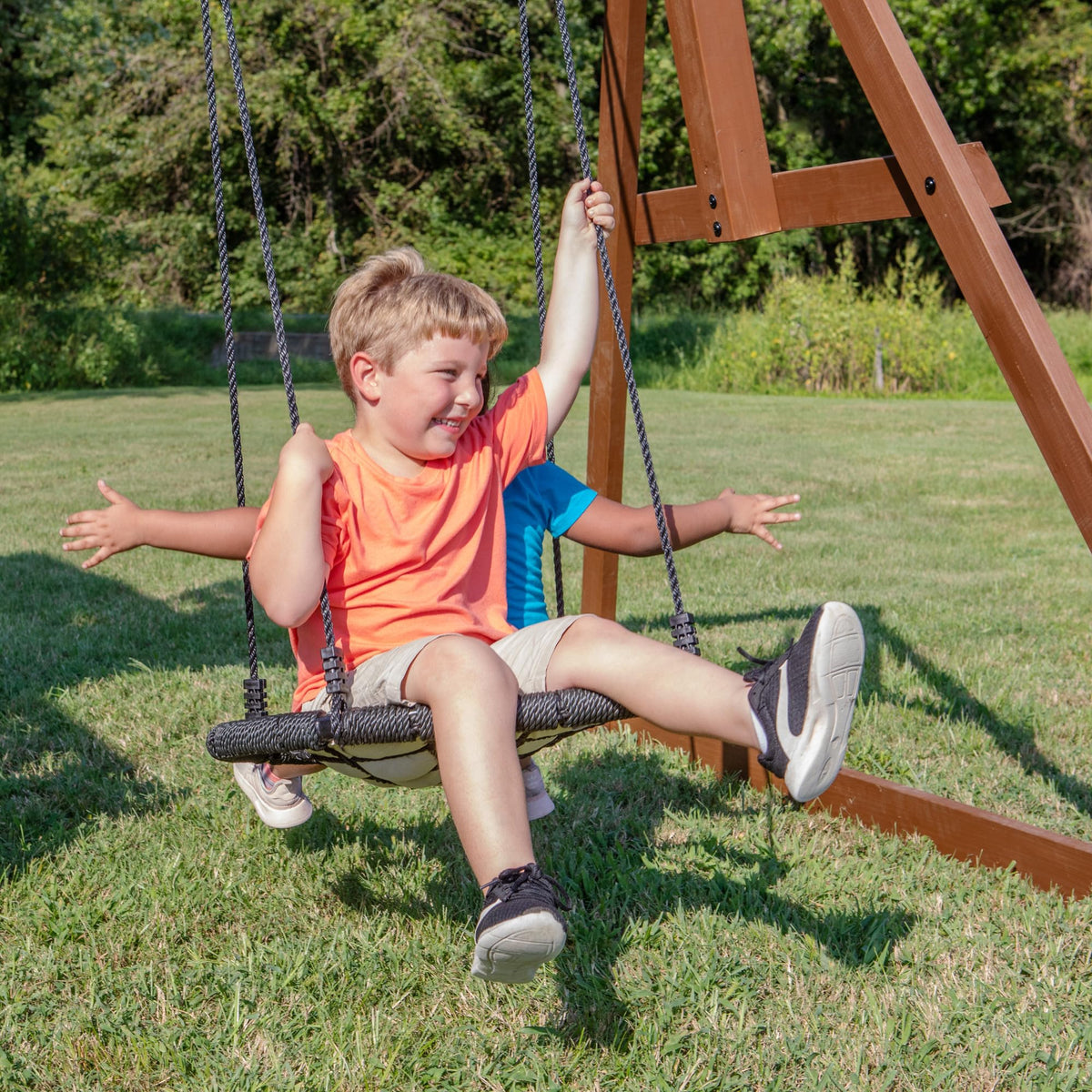 Crow's nest telescope on Skyfort II invites imaginative lookout above the yard.