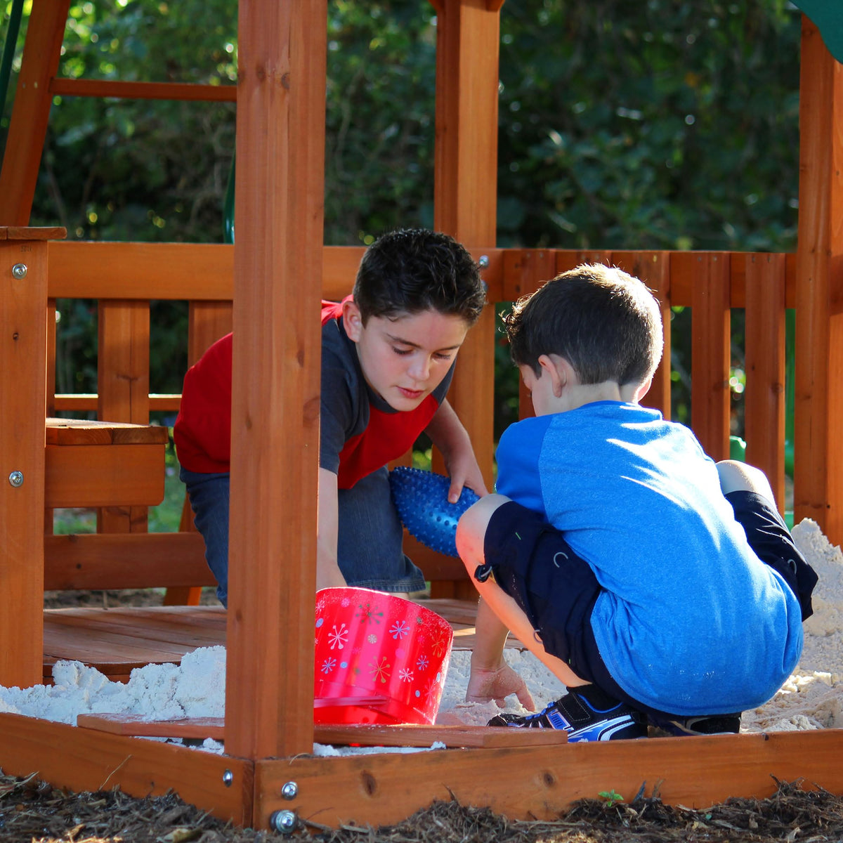 Skyfort II lower deck sandbox invites sensory play and sharing.