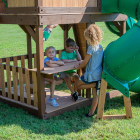 Backyard Discovery Skyfort II two belt swings and web swing for energetic outdoor play.
