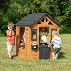 Backyard Discovery Sweetwater half-door creates inviting realistic entrance for kids.