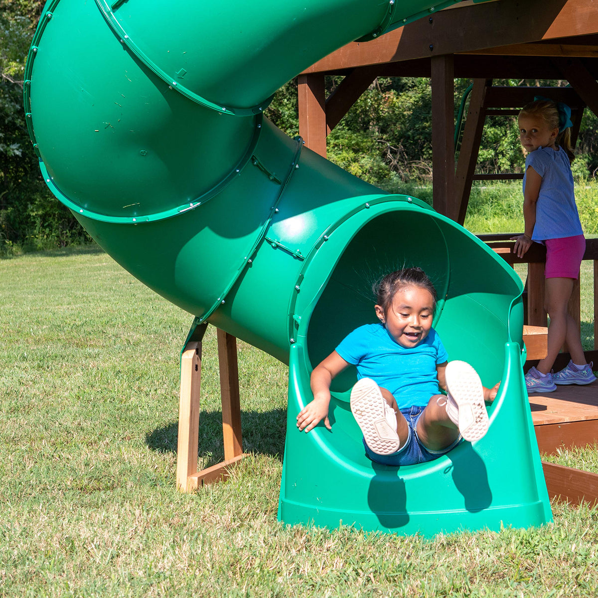 Backyard Discovery tall spiral slide installed on a 5 ft deck, green, for safe outdoor fun.