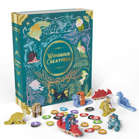 BAD COMET Wondrous Creatures cards and habitat tiles for strategic tableau building.