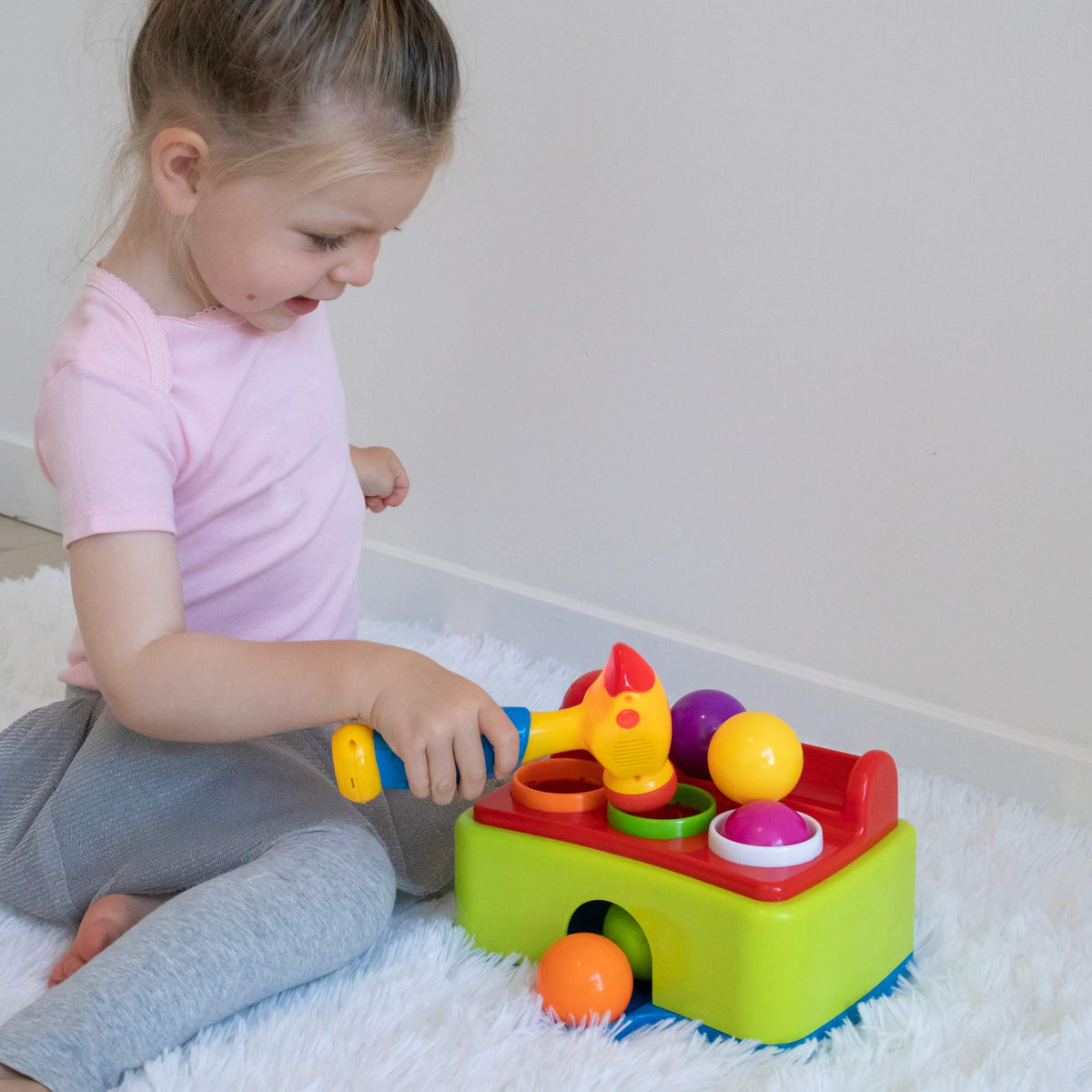 Bambiya Ball Popper Ball Drop in action boosts fine motor skills and coordination.