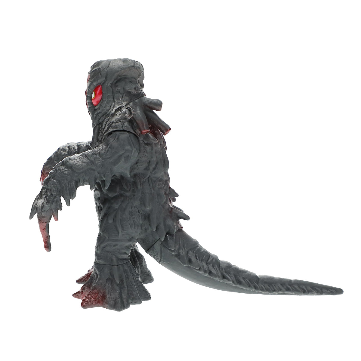 Bandai Namco Hedorah side view figure highlights intricate vinyl texture for display.