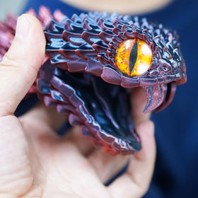 BANPIWOLG lifelike snake model enhances desk setup and conversation.