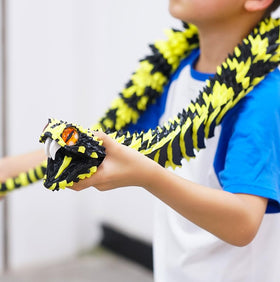 BANPIWOLG snake model serves as a stress-relief and fidget toy option.