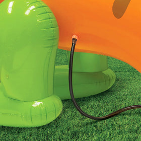 BANZAI T-Rex Terror Mondo Sprinkler inflated to its large dimensions in the yard